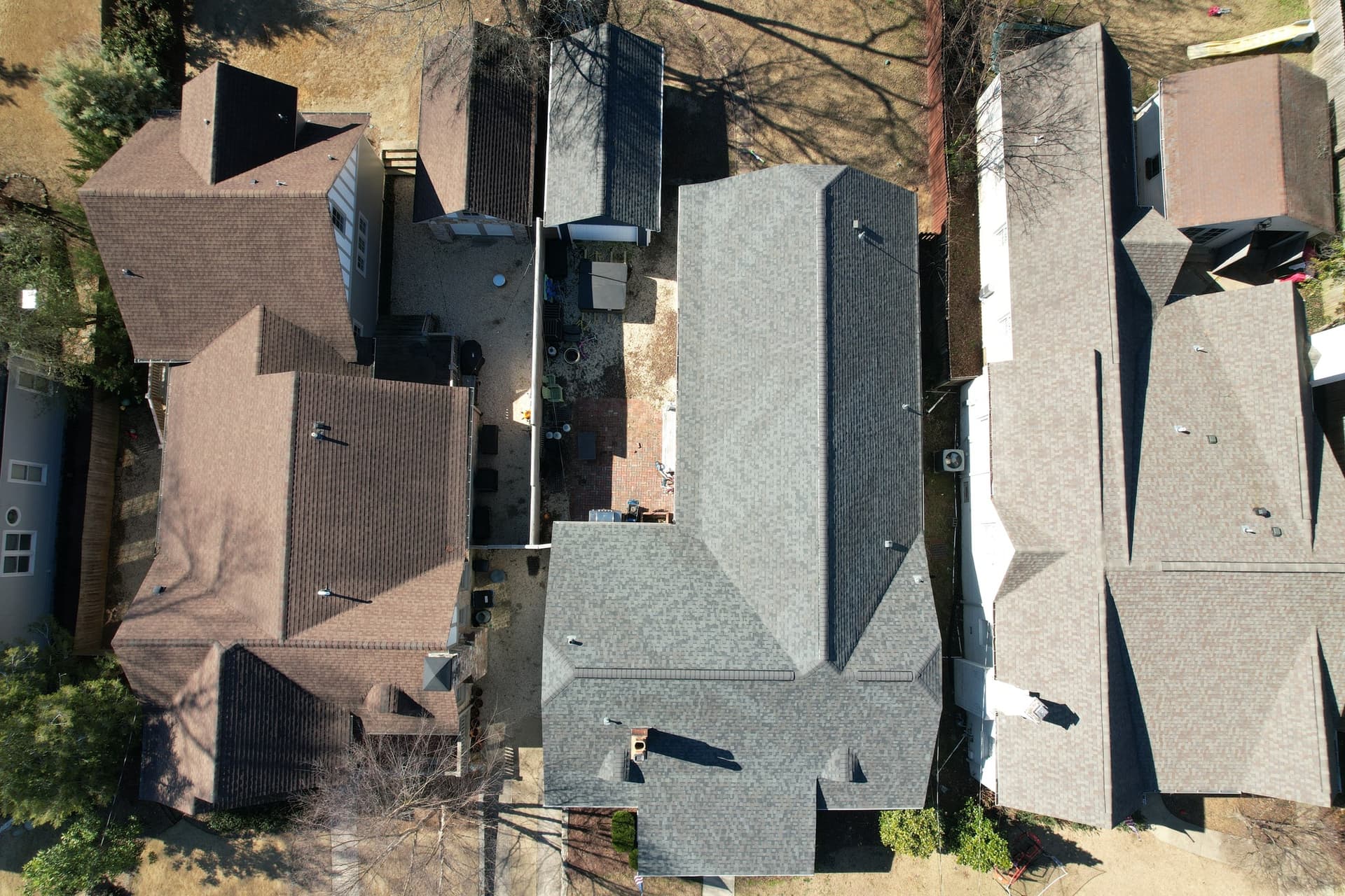 Neighborhood roofline view representing Birmingham-area city service coverage.